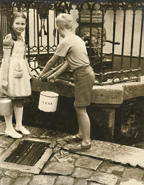 Children Fetching Pails of  Water