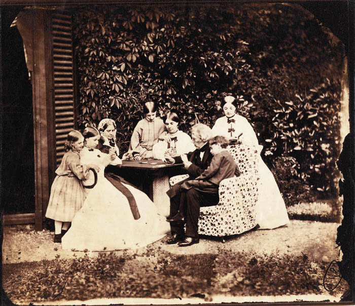 Hassard Dodson Family Sitting Round a Table Playing Cards