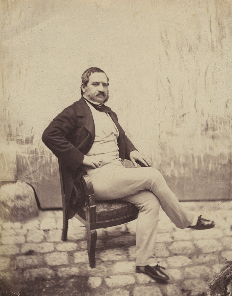 Charles Negre - Sitting Mustached Gentleman in the Courtyard of 21 Quay Bourbon