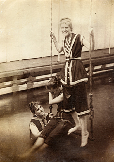 Women at a Swimming Pool on Swing over Water