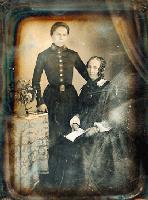 Anonymous (French) - Boy in Military Uniform with Mother with Stereo Viewer and Flowers on Table