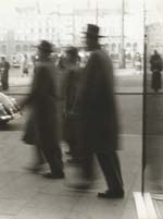 Reinhart Wolf - Three Men on Street Walking