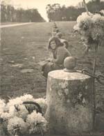 Laure Albin-Guillot - Children Sitting with Flowers Laure Albin-Guillot - Children Sitting with Flowers