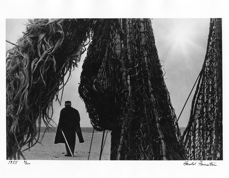 Harold Feinstein - Man Behind a Fishing Net