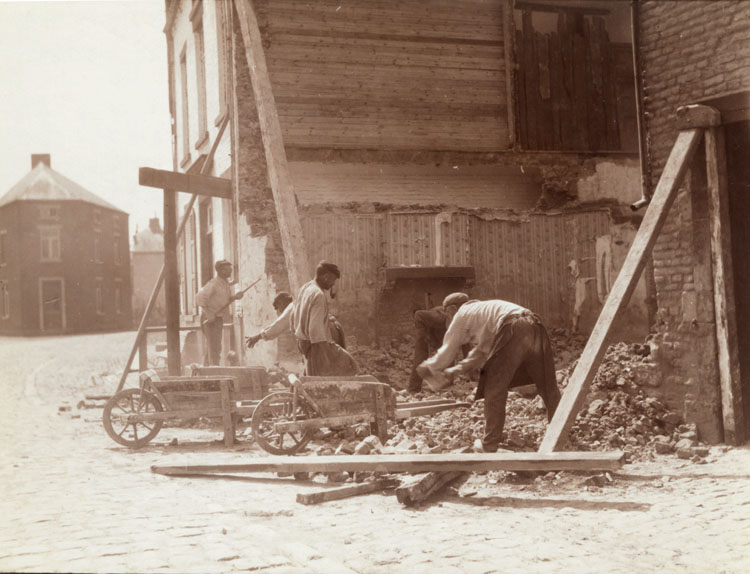 Workers Tearing down Part of Building in Belgium