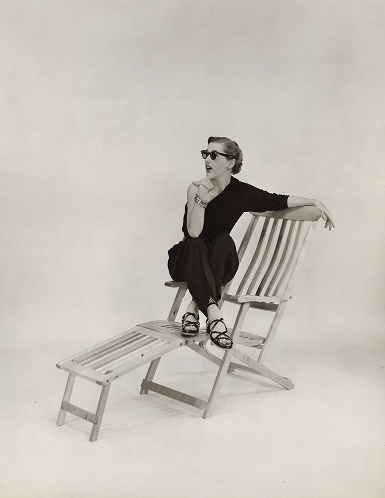 Advertising Image of a Woman on Folding Beach Chair