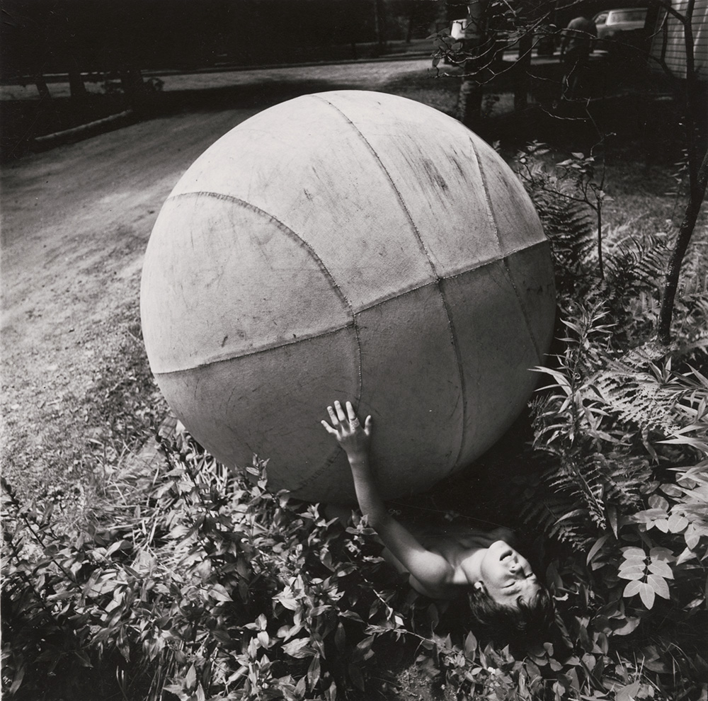 Boy with Giant Ball, New York