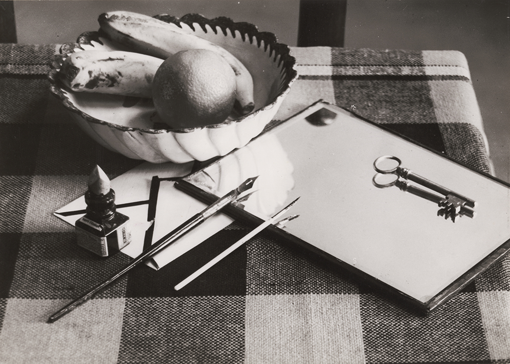 André Kertész - Modernist Still Life: Table with Fruit Bowl, Ink and Pen, Mirror and Key