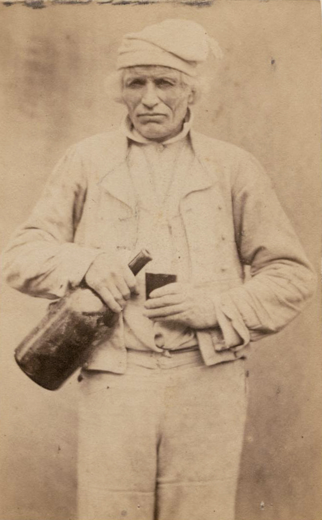 Anonymous - Older French Man Holding Glass and a Magnum of Wine