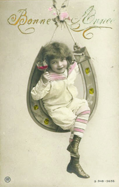 Anonymous - Boy Toasting the New Year from a Hanging Horse Shoe