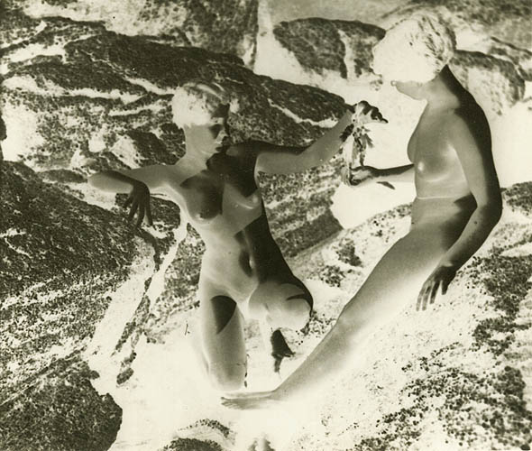 A Negative Print of Two Nude Women on Rocks