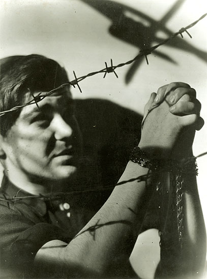 Bohumil Stastny - Boy Praying in Chains Against Barbed Wire