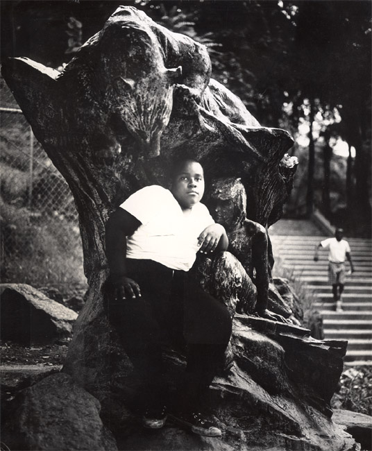 Arthur Tress - In an Old Bronze Statue a Negro Youth Sits in Morningside Park, NYC