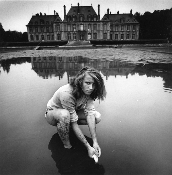 Girl Collecting Gold Fish, France