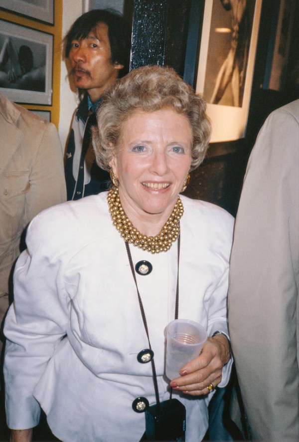 Photograph of Marjorie Neikrug at the opening of her 1990 "Rated X Show". Photo by John A. Mozzer.